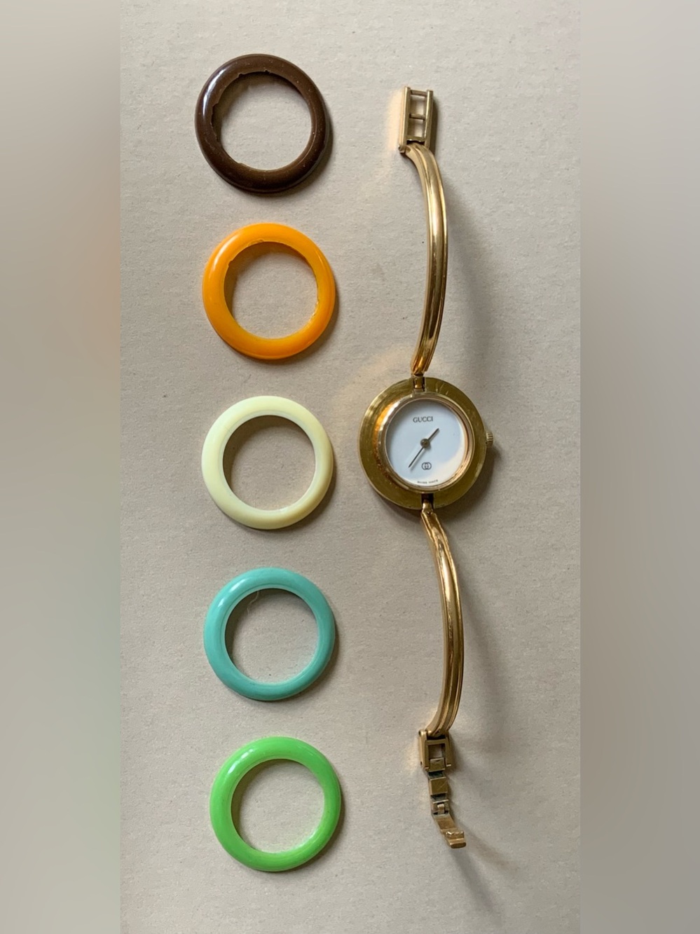 Vintage 6”-6.5” Gucci 1100 L Gold-Tone Bangle Watch with 5 Bezels